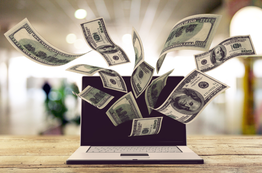 A imagem de notas de dinheiro saindo de um laptop, destaca a recompensa financeira de estratégias digitais. Isso sugere que o conteúdo aborda como uma VSL bem elaborada é uma ferramenta poderosa para impulsionar vendas e gerar lucros, transformando o engajamento do vídeo em resultados monetários concretos.